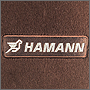 Вышитый логотип Hamann на автомобильном коврике