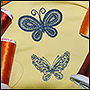 Вышивка бабочек на занавеске