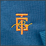 Вышитый на свитере логотип